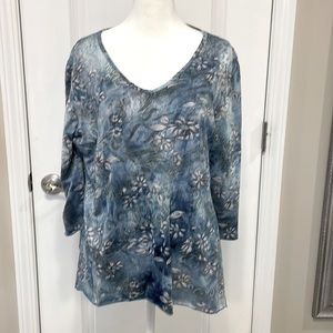 Purchased via Dress Barn.  Size XL - will fit large nicely